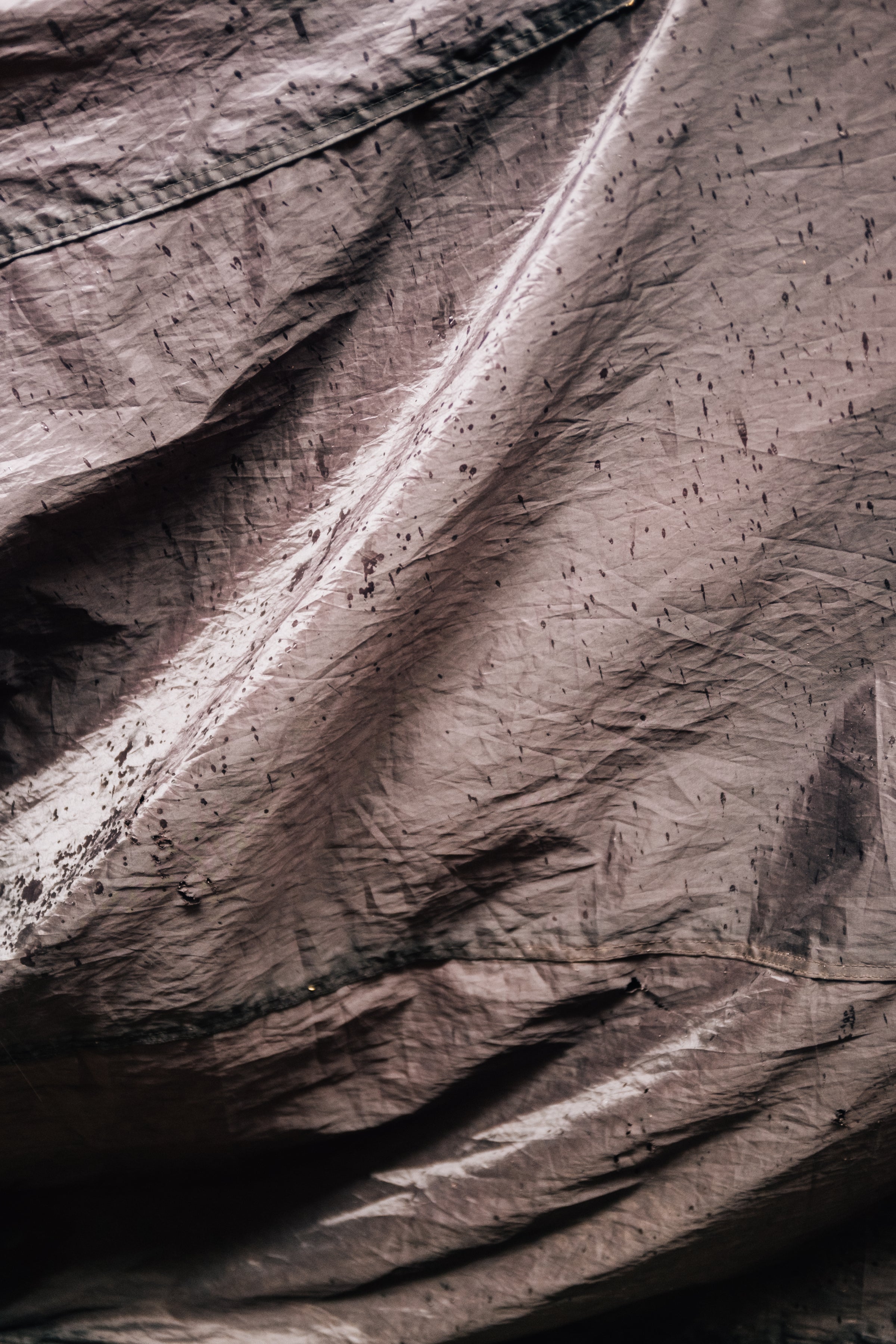 Draped fabric in raking light, close-up of the weave