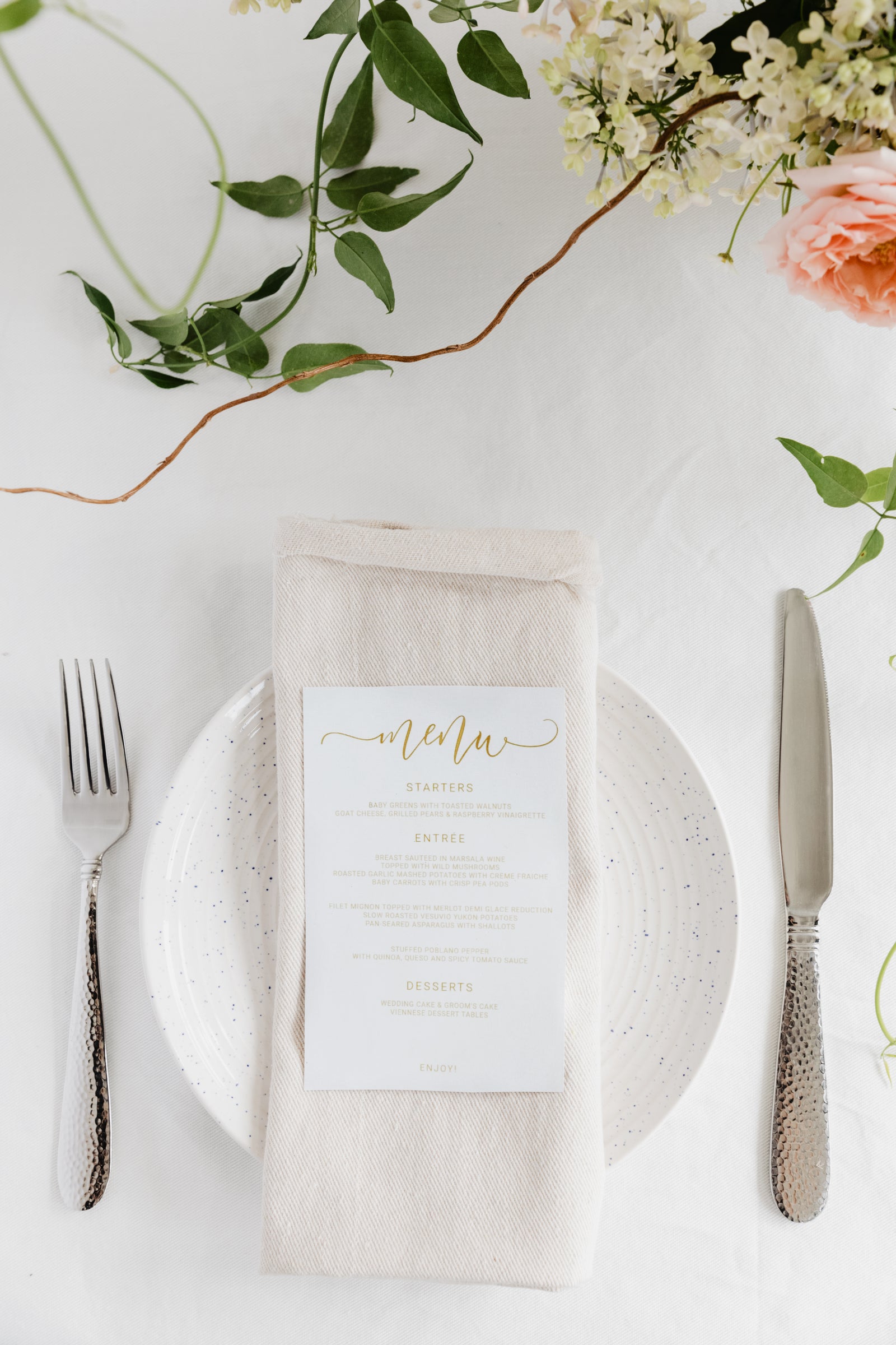 Folded linen napkin on a place setting